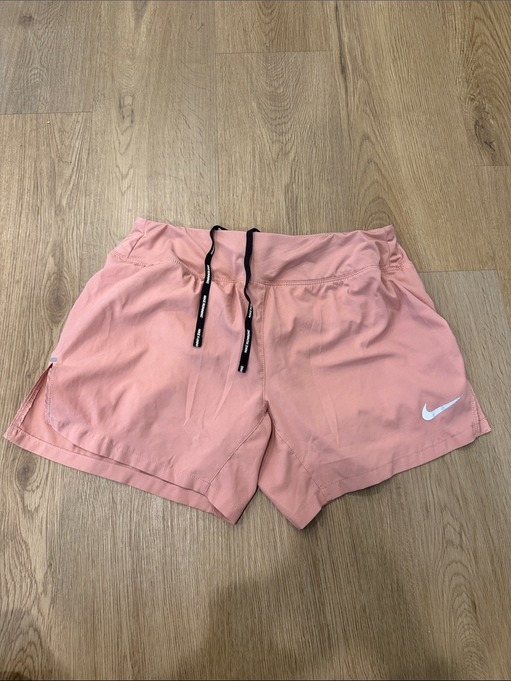Nike Women's Coral Pink Athletic Running Shorts with Black Drawstring